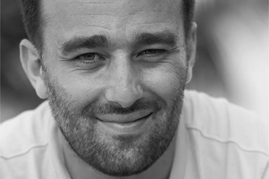 Black and white portrait headshot of the French photographer Réhahn